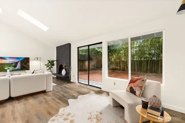 The living space opens to the level backyard.