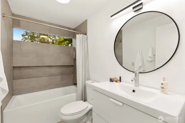 Shared full bathroom has also been fully updated.