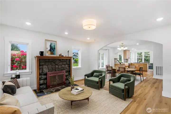 Living room with wood burning fireplace. Living room with wood burning fireplace.