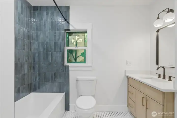Hallway bathroom on main floor. Hallway bathroom on main floor.