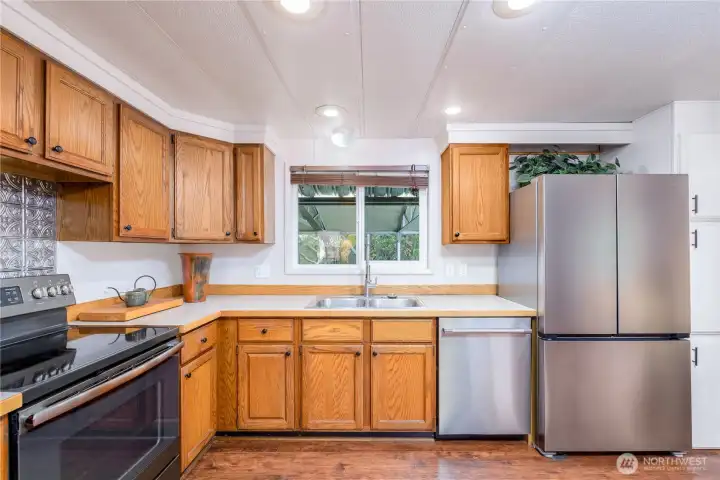 Imagine doing dishes with the warm summer breeze blowing through the window with smells of meals wafting out the window inviting your guests to a lovely home.