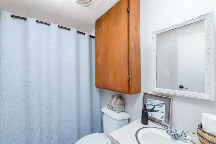 Guest bath with new flooring.