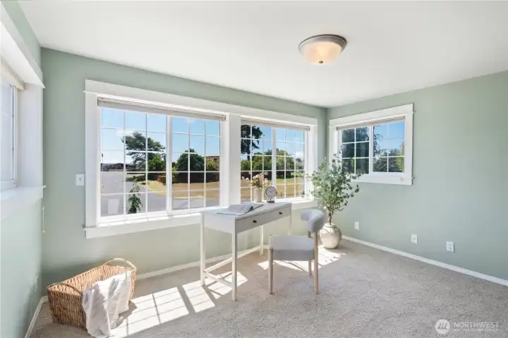 Upstairs loft area with partial views of Birch Bay