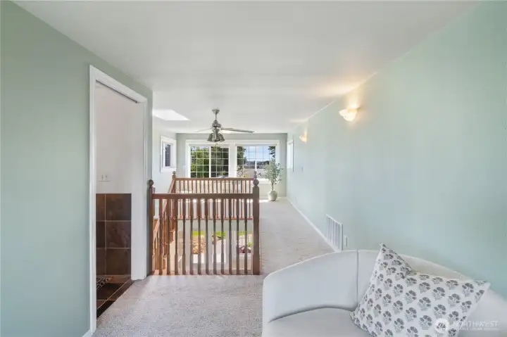 Loft area complete with closet and half bathroom perfect for guest area, 3rd bedroom or home office