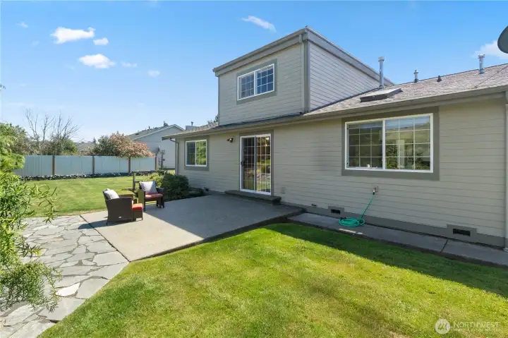 Lovely private back patio with mature landscaping