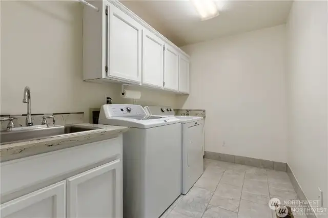 Laundry / Mud room conveniently located at Garage Entry