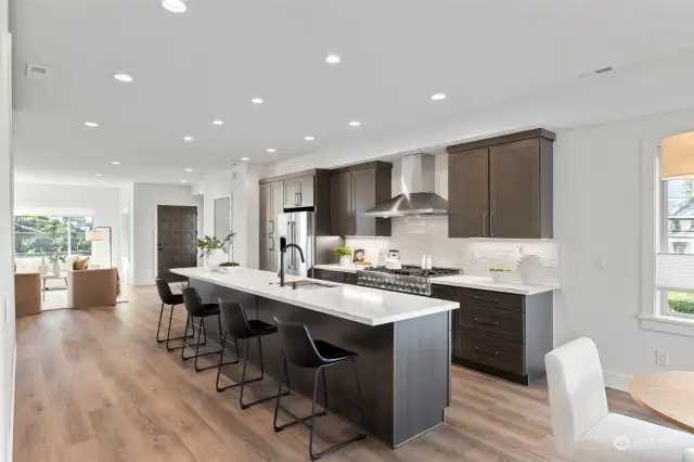 Beautiful wood cabintry ans solid slab quartz counters.