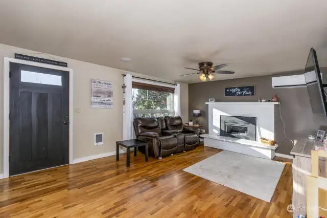 Entry with living room to the left (kitchen to the right).