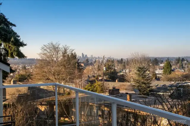 Front deck with glass railing with spectacular city view