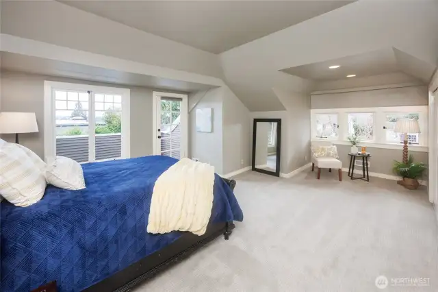 Primary suite includes a view balcony, full bathroom & reading nook.