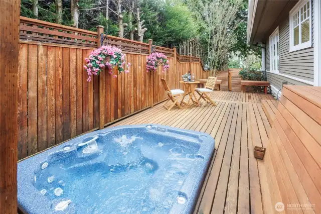Relax & unwind in the private hot tub.