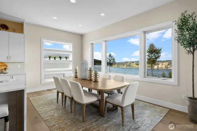Dinner with a western exposure? Absolutely. This light-filled dining area offers abundant space and a picturesque setting—perfect for everyday meals or elegant gatherings.