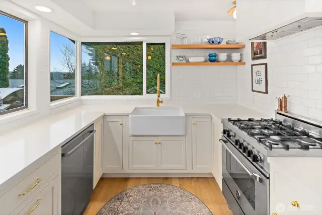 High end stainless steel appliances including a Bertazzoni natural gas range
