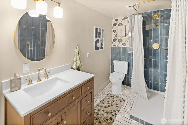 Guest bathroom with floor to ceiling subway tile