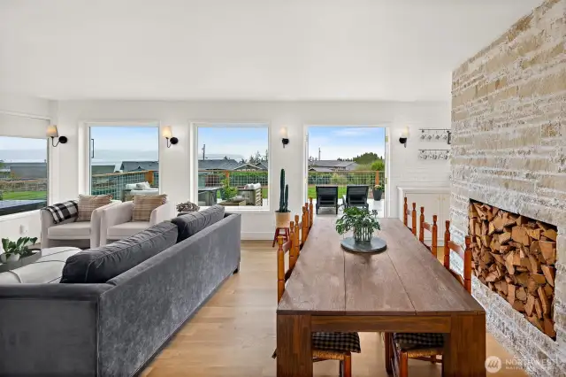 Dining and living areas with sweeping views of Saratoga Passage and Skagit Bay