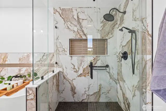 Glass enclosure on walk in shower.
