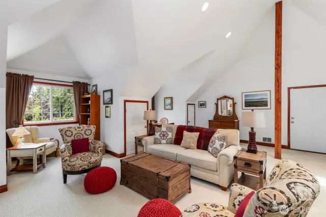 Upstairs mother in law apt enjoys vaulted ceilings, mini kitchen, private 3/4 bath and loads of storage in attic areas.
