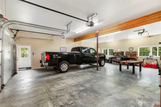Viewing shop area with deep sink, under stair storage and 220V outlet power available.