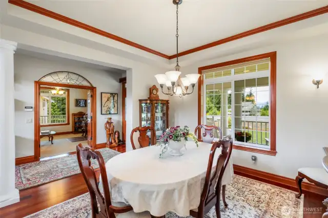 Formal dining room enjoys territorial views and is light and bright. Tray ceilings add volume to this dining room.