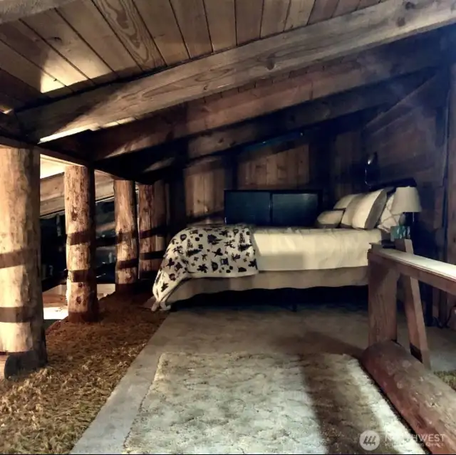 The spacious loft has room for two beds.