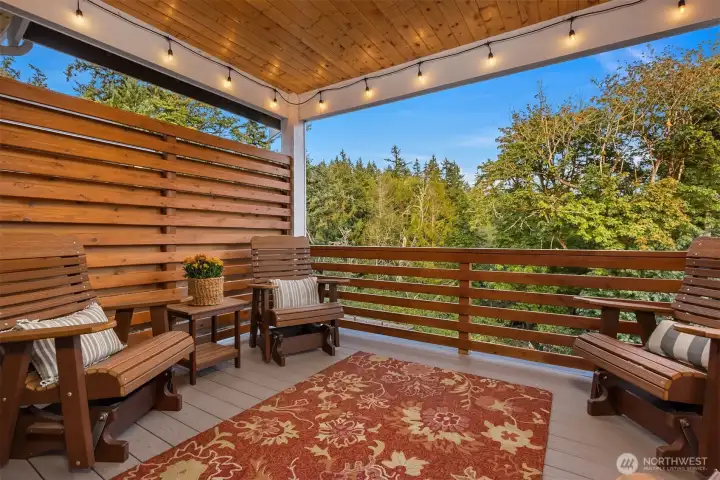 Step outside to a covered trek deck for year-round enjoyment.