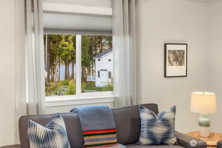 The family room window is the prefect perch to soak in the water views.