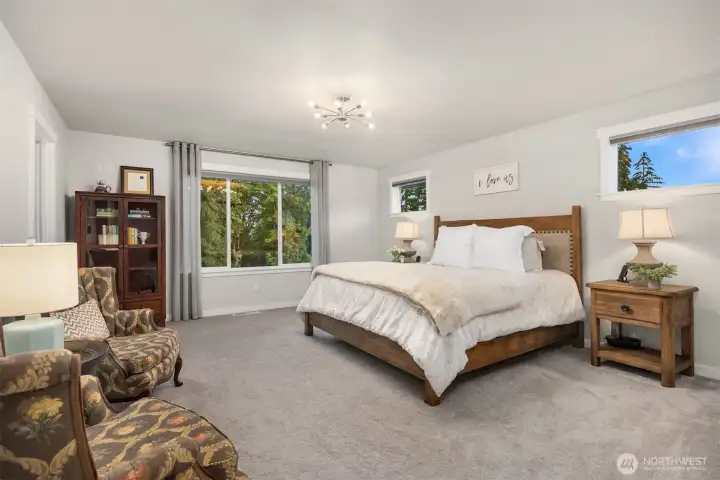 At the top of the stairway sits the generous sized primary bedroom.