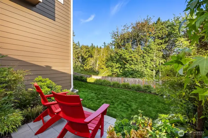Enjoy peace and privacy from this backyard perch facing East.