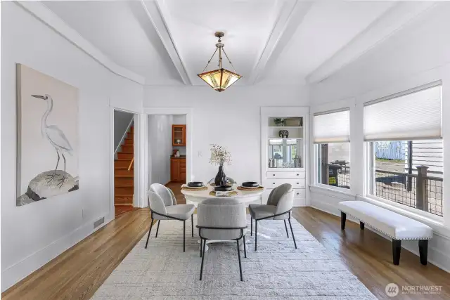 Wonderful dedicated dining room space with bay windows