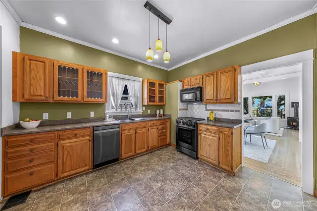 Lots of counter space with oak cabinetry