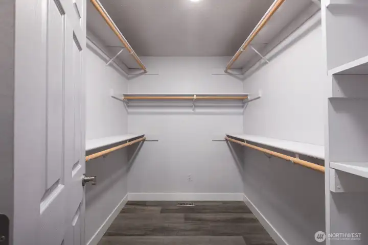 Primary bedroom walk-in closet