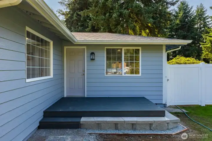 Separate porch and entrance with enclosed space inside