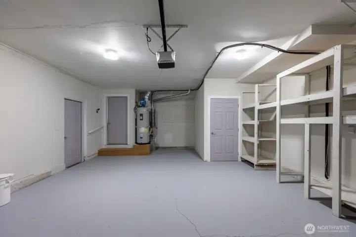 2 car garage with storage shelves