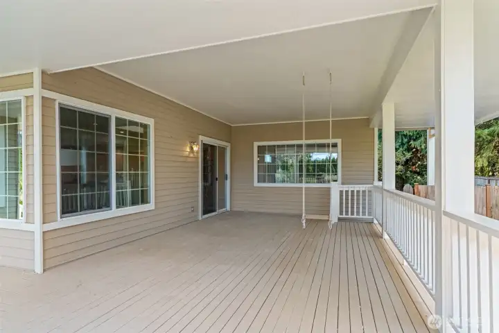 The covered porch is the perfect place for entertaining or simply relaxing after a long day.