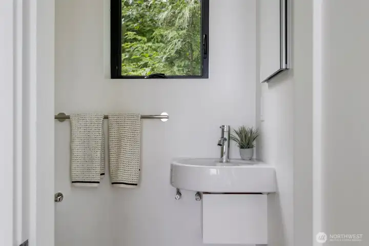 There is an en-suite 1/2 bath in the primary