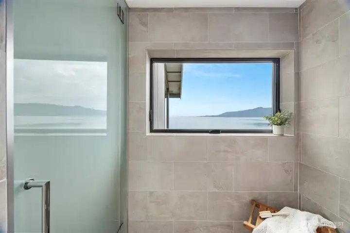 This shower feels like you have walked into a spa and has bay views as well!