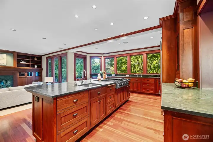Expansive chefs' kitchen with access to the rear deck.