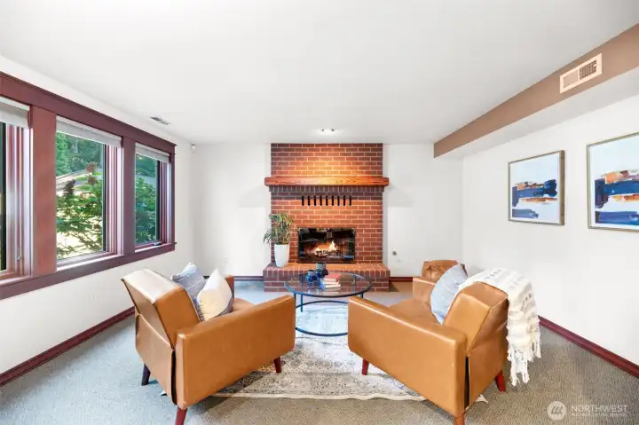 Downstairs bonus room with gas fireplace.