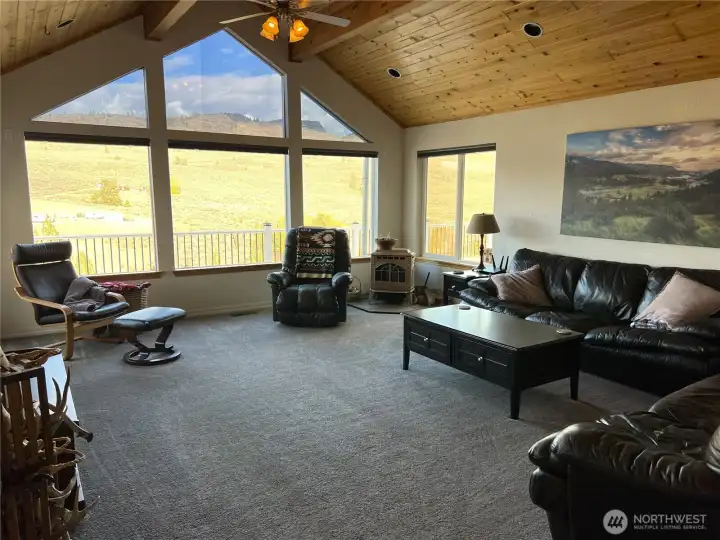 Vaulted ceilings and large windows for natural light.