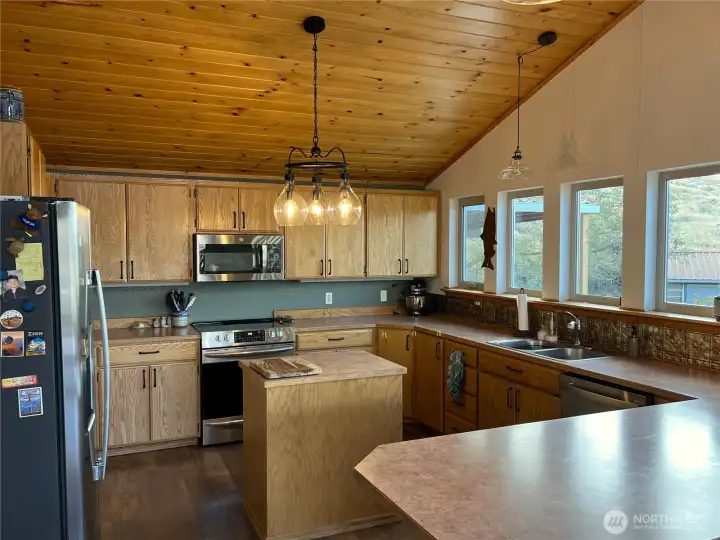 Spacious kitchen with beautiful westerly views.