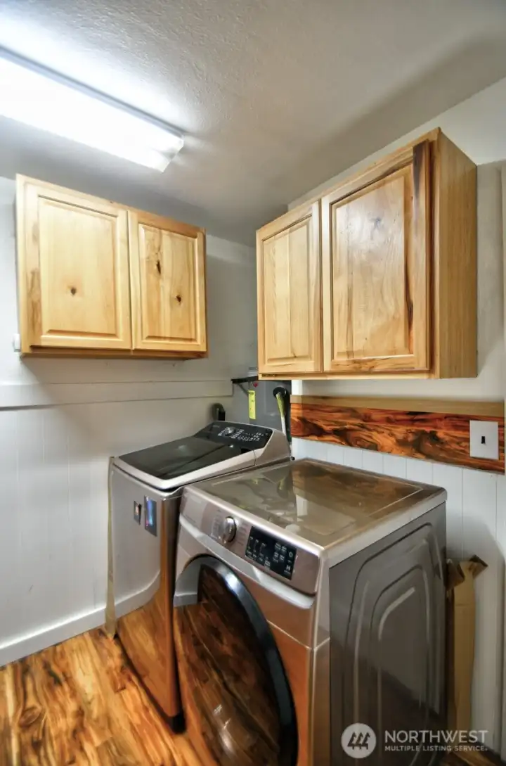 Central easy access laundry room.
