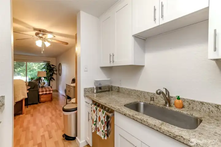 This cheerful kitchen has ample storage space.