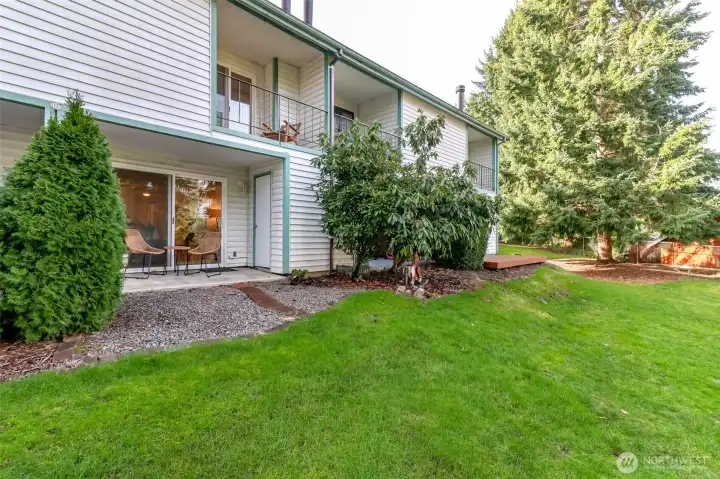 Very private ground patio and upper-level balcony.