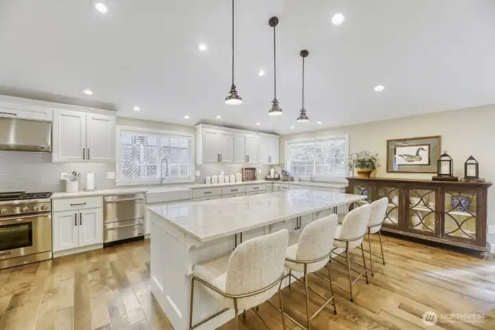 Kitchen has quartzite counter tops.  Custom cabinets/with soft close doors.  All appliances stay with home