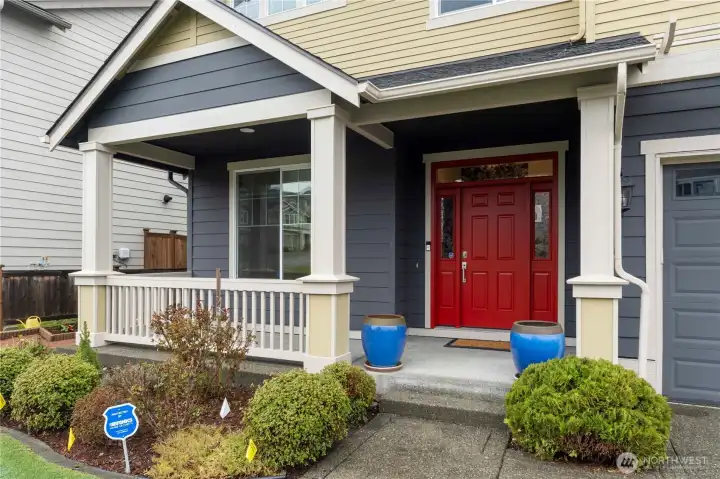 Charming front entry and neatly maintained landscaping