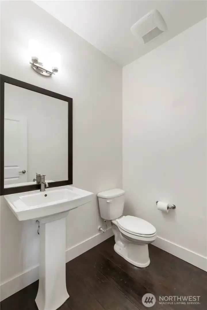Main-level powder room with a clean, modern design
