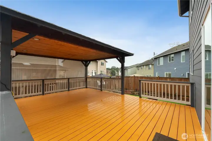 Expansive deck with a covered section and plenty of room for entertaining