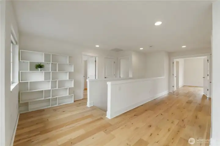 Upper level featuring upgraded flooring throughout