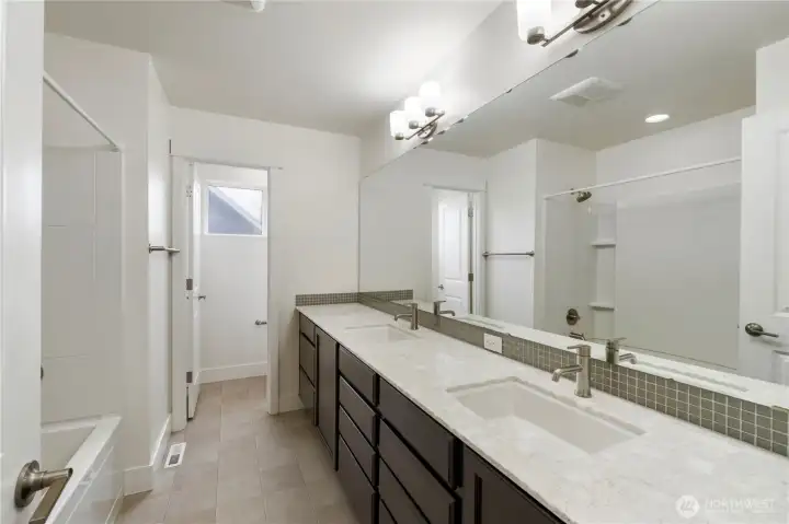 Upper-level full bath with a double vanity