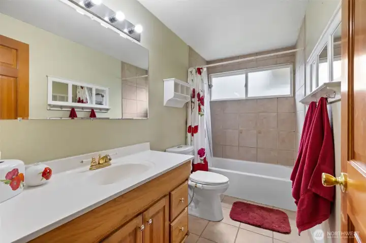 Full bath adjacent to bedrooms 2 and 3.